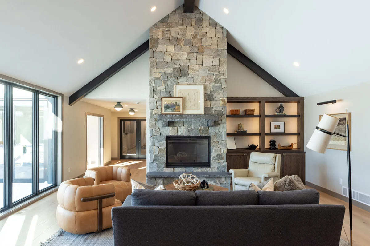 Front-facing view of great room fireplace in custom home by Ross Construction in Rib Mountain, WI.