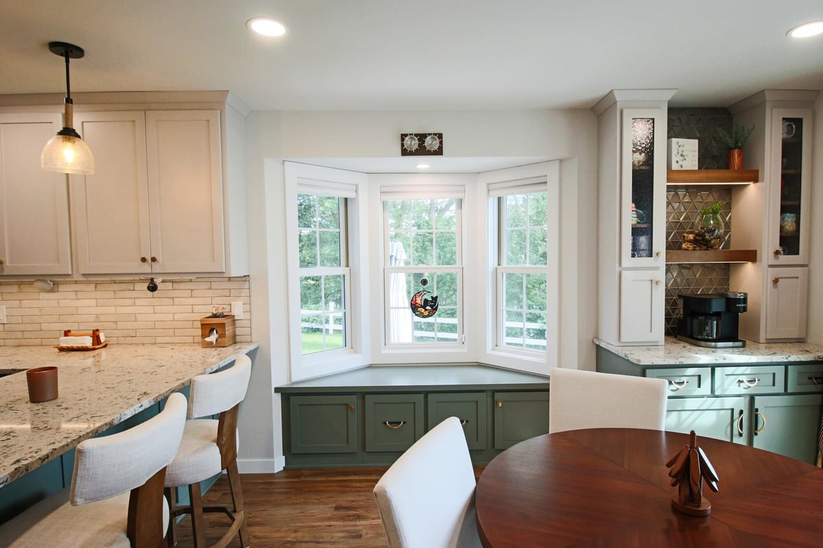 Ross Construction kitchen remodel in Marathon, WI showcasing decorative backsplash and coffee bar.