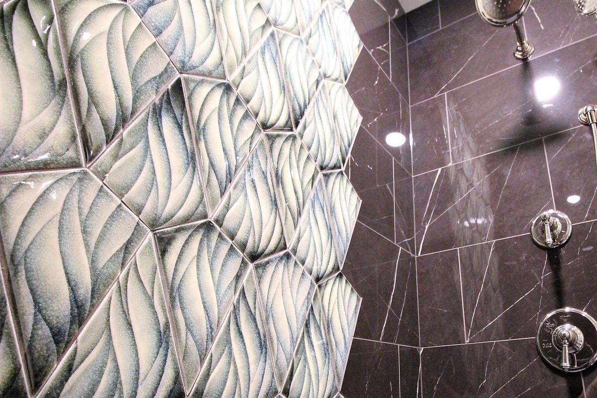 Unique geometric tile design in a Ross Construction custom home bathroom in Wisconsin.
