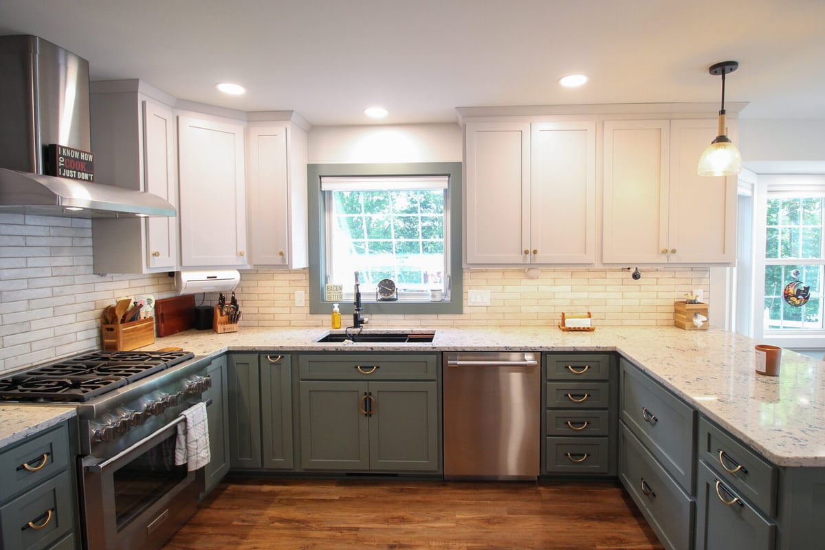 Full view of custom kitchen remodel in Marathon by Ross Construction with window over sink.
