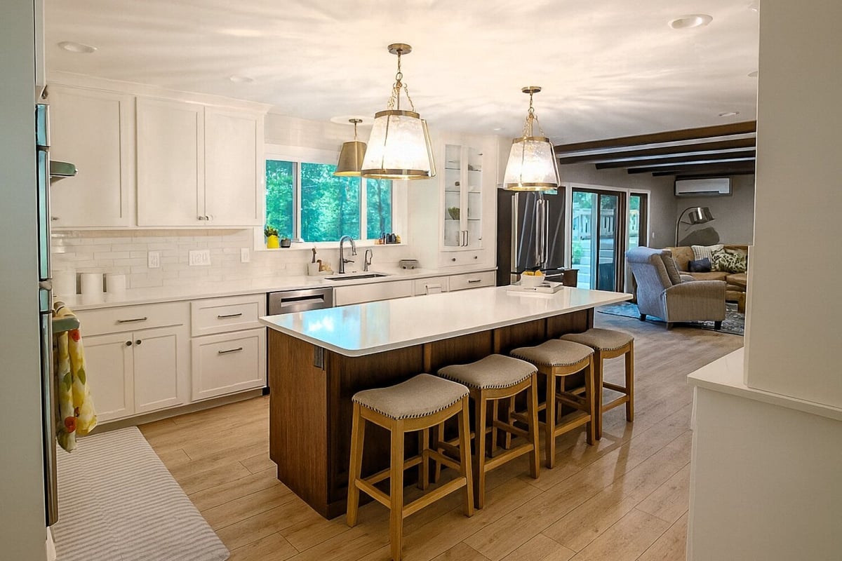 Ross Construction kitchen remodel with oversized island and view into living space in Rib Mountain, WI.