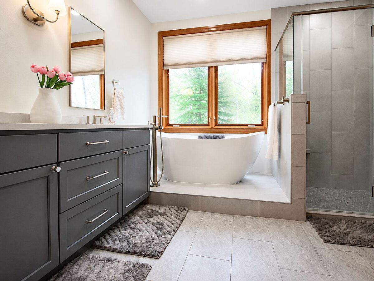 primary-bathroom-remodel-vanity-tub-and-shower-wide-view-minocqua-wi
