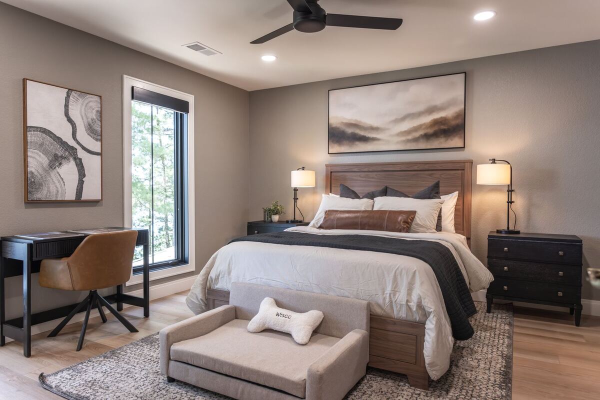 whole home remodel guest bedroom with walnut bed and desk minocqua wi