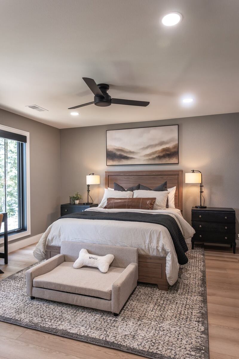 whole home remodel guest bedroom with walnut bed front view minocqua wi