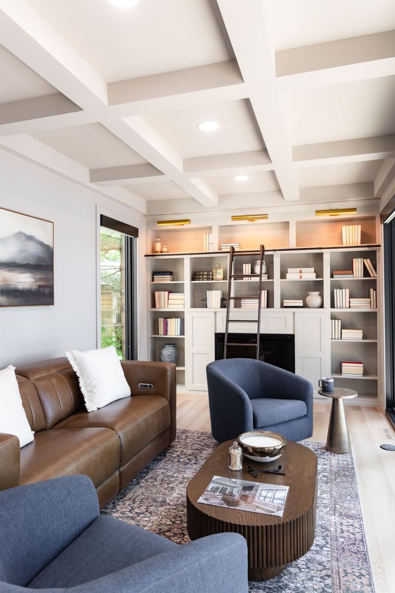 whole home remodel library with rolling ladder and coffered ceiling minocqua wi