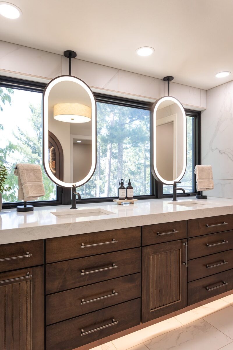 whole home remodel primary bathroom double vanity with suspended lighted mirrors minocqua wi