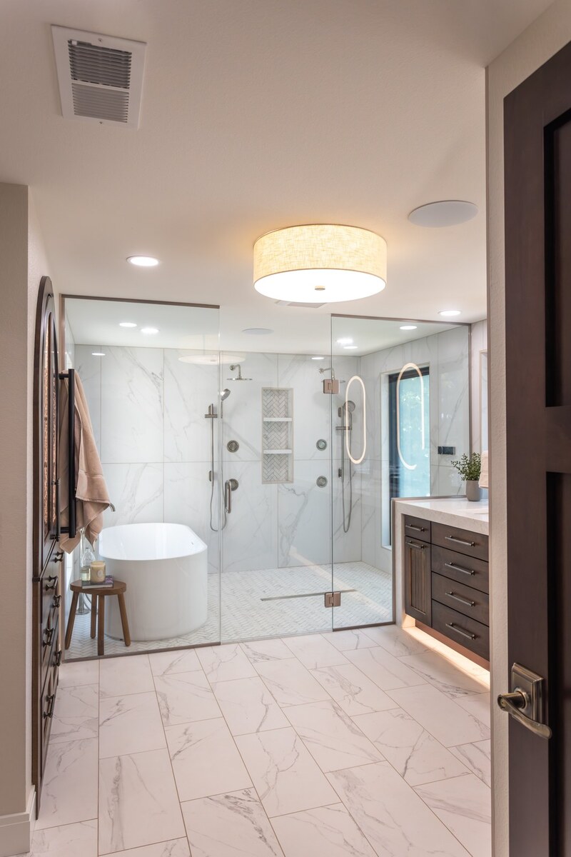 whole home remodel primary bathroom entry view with freestanding tub minocqua wi