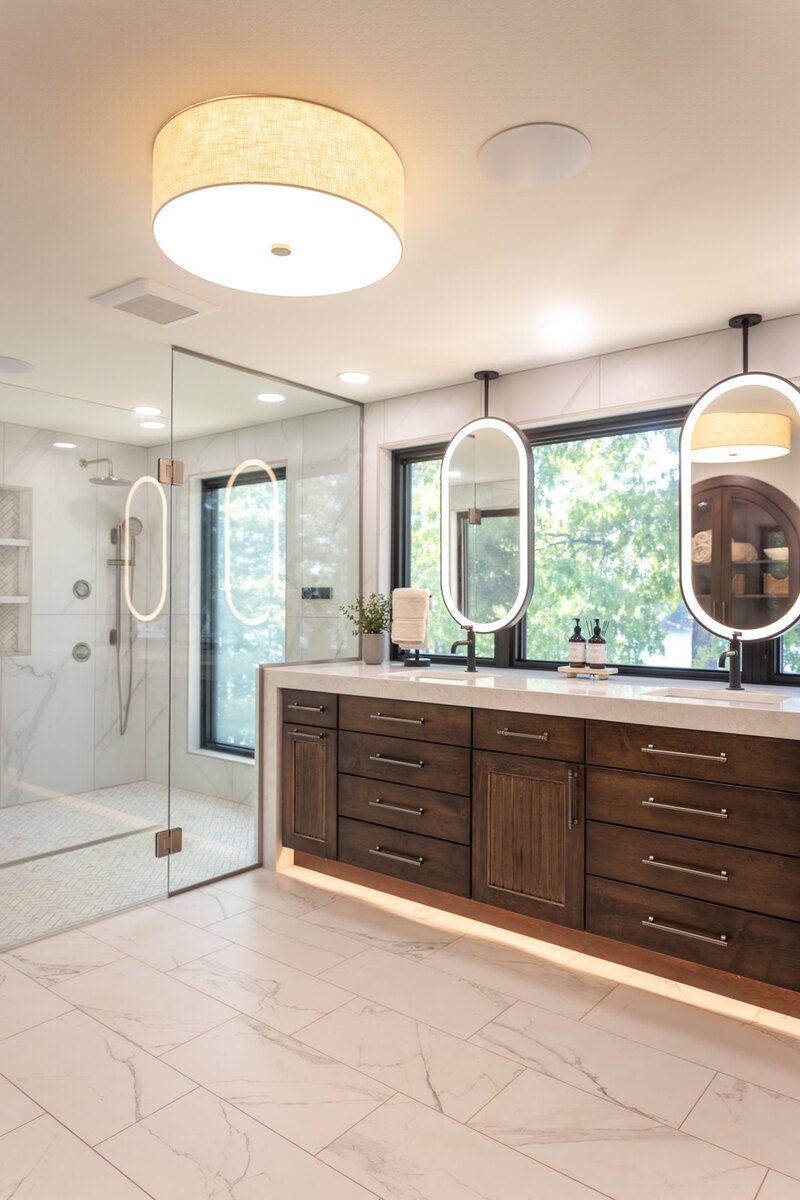 whole home remodel primary bathroom floating vanity with lighted mirrors minocqua wi