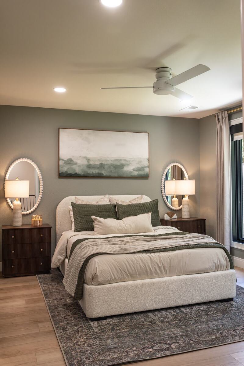 whole home remodel sage green bedroom with boucle bed front view minocqua wi