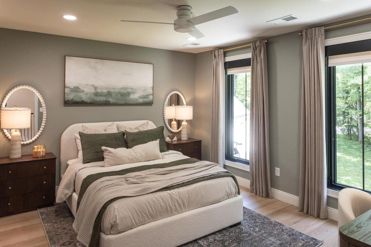 whole home remodel sage green bedroom with boucle bed minocqua wi