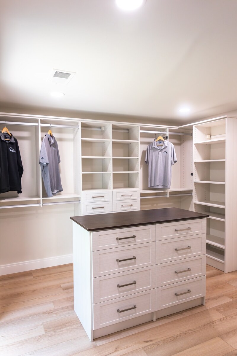 whole home remodel walk-in closet with center island minocqua wi