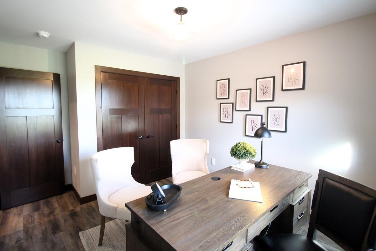 Home office with natural light in Marathon, WI custom home built by Ross Construction.