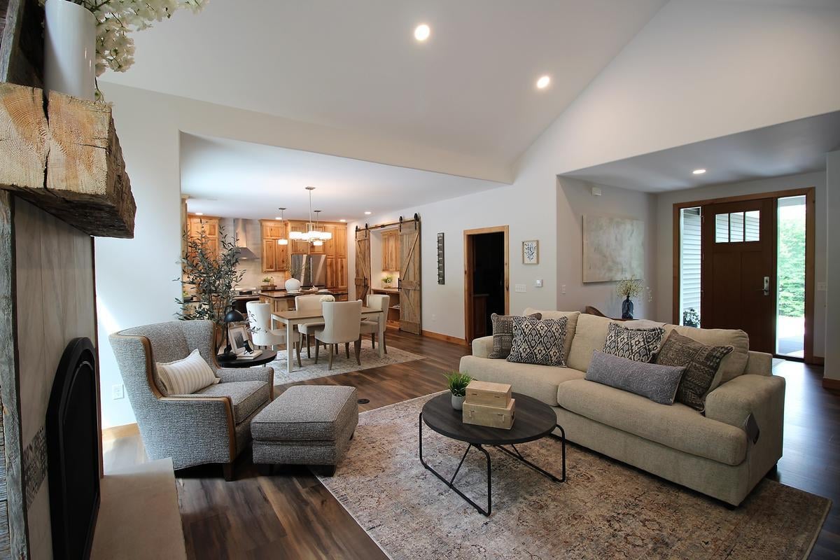 Inviting living and dining area in a custom Rib Mountain, WI home built by Ross Construction.
