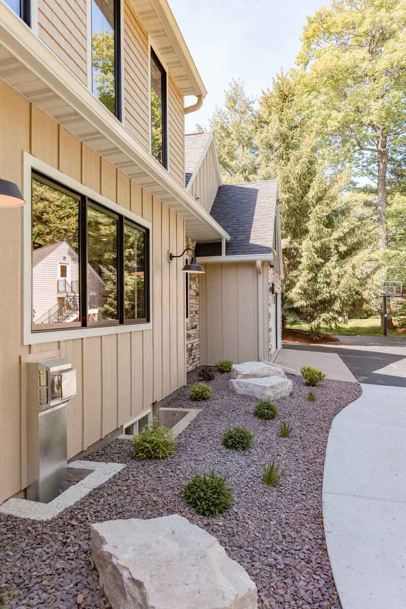 whole home remodel exterior board and batten siding and landscaping minocqua wi