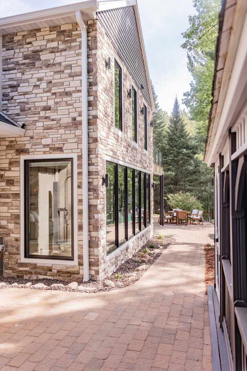 whole home remodel exterior side paver walkway and stone  minocqua wi