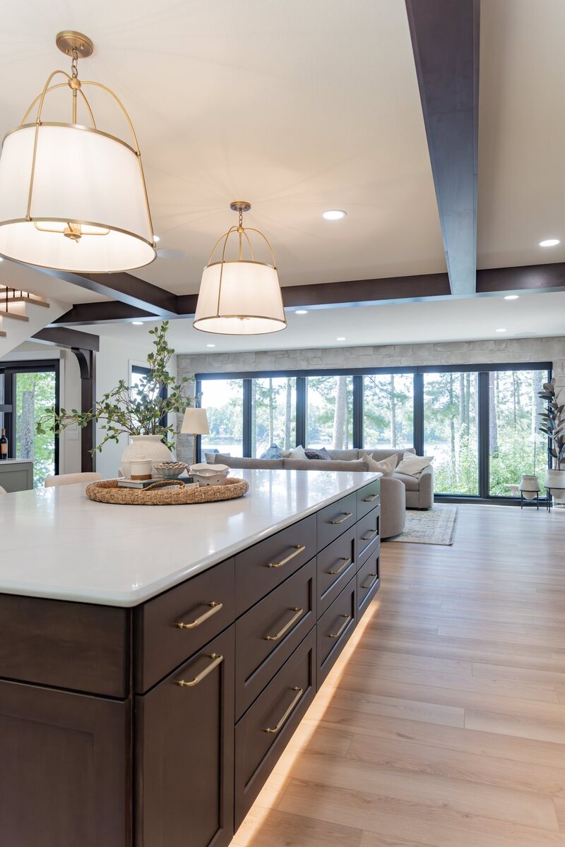 whole home remodel kitchen island with view to living room and lake minocqua wi