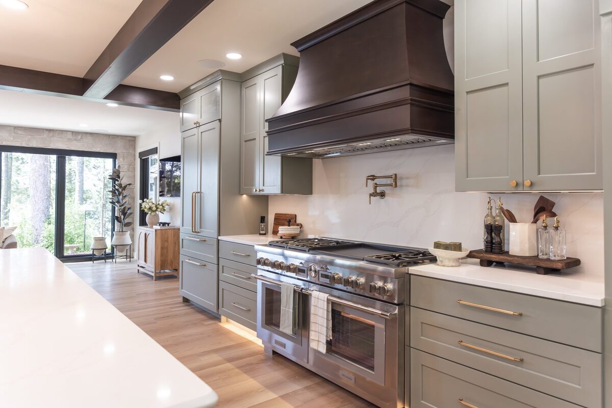whole home remodel kitchen professional range and panel ready refrigerator angled view minocqua wi