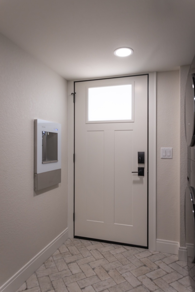 whole home remodel mudroom entry door with bottle filling station minocqua wi
