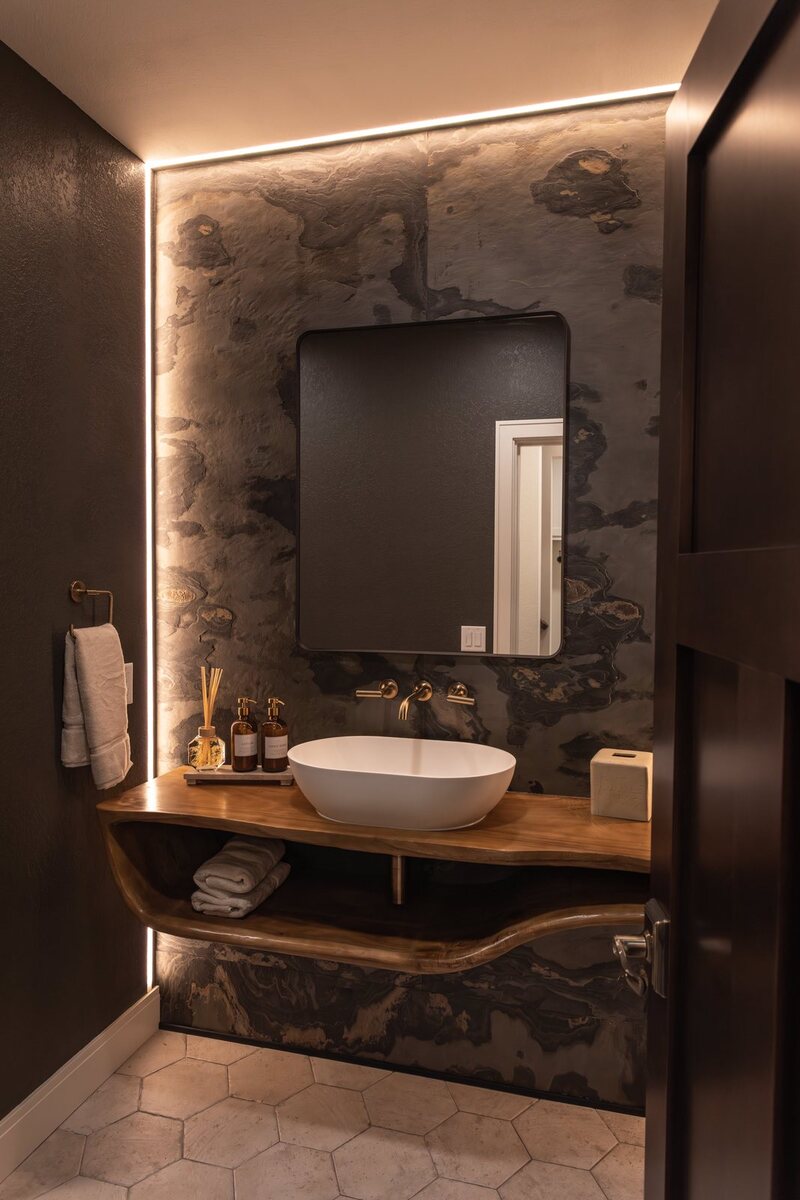 whole home remodel powder room with backlit slate accent wall minocqua wi