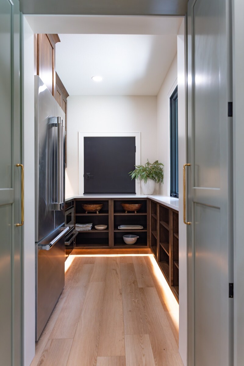 whole home remodel walk-in pantry through sage double doors minocqua wi