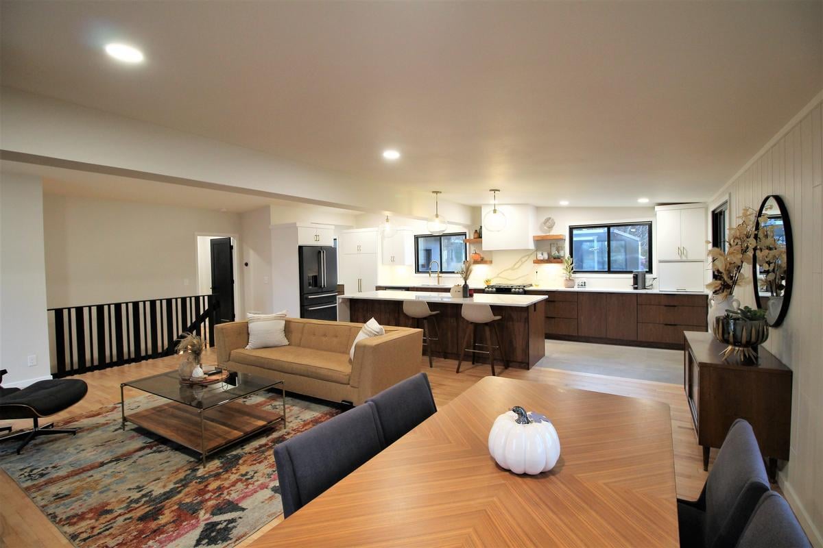 Stylish custom home interior with integrated kitchen and living area by Ross Construction in Rib Mountain, WI.