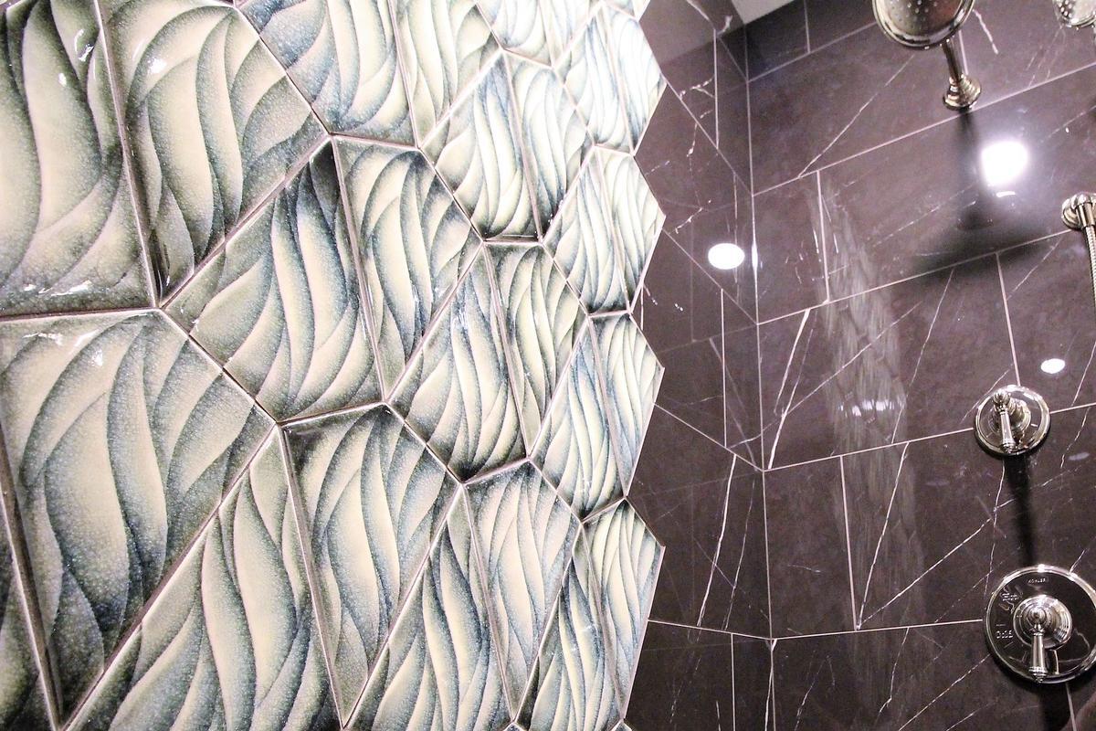 Unique geometric tile design in a Ross Construction custom home bathroom in Wisconsin.