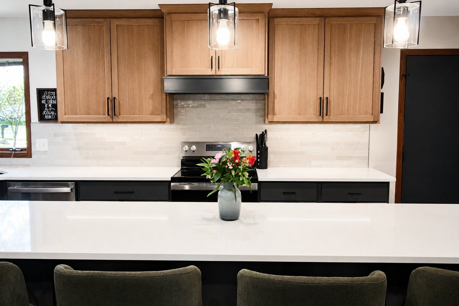 kitchen remodel stove range tile backsplash natural wood upper cabinets